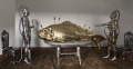 Entang Wiharso, Feast Table: Undeclared Perceptions, 2012, Cast aluminum, cast brass, Persian carpet, 200 x 400 x 300 cm | 78.74 x 157.48 x 118.11 in, Edition 1 of 2 in brass and aluminum (plus 1 artist proof in graphite and resin) # WIHA0071 