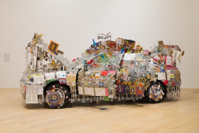 Thomas Hirschhorn, Spinoza Car,"French Window: Looking at Contemporary Art through the Marcel Duchamp Prize", installation view: Mori Art Museum (2011/3/26-2011/8/28); Photo: Watanabe Osamu; Photo Courtesy: Mori Art Museum, 2009, Car, wood, paint, tape, cardboard, paper, marker, ball-point pen, transparent foil, stickers, books, magazines, prints, plastic toys, fans, mirrors, ceramic objects, clocks, audio cds, electric wire, lamps, notebooks, car gadgets 