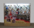 Thomas Hirschhorn, Tool Vitrine, 2009, wood, plexiglas, mannequins, prints, spray-paint, tape, neon, lights, table, nails, electrical cable, expanded foam, 221 x 256 x 95 cm | 87.01 x 100.79 x 37.4 in, # HIRS0447 