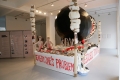 Thomas Hirschhorn, Black & White Hemisphere, 2008, Wood, cardboard, red, white, black painting, transparent and brown adhesive tape, electric cord, foam, skins of sheep, model’s bust, arms, heads, lobs of brains, basin, fabric, prints, 330 x 250 x 505 cm /129,92 x 98,43 x 198,82 in, HIRS0448, Ausstellungsansicht im NBK, Berlin, © Neuer Berliner Kunstverein n.b.k., photo: Jens Ziehe 